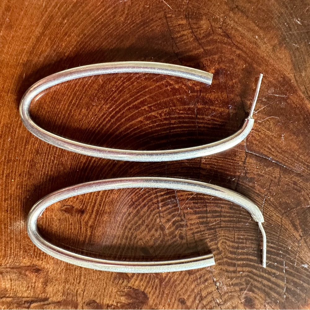 Sterling silver elongated hoop earrings